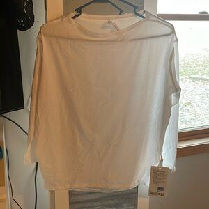 NEW Lulu back in action long sleeve - size four